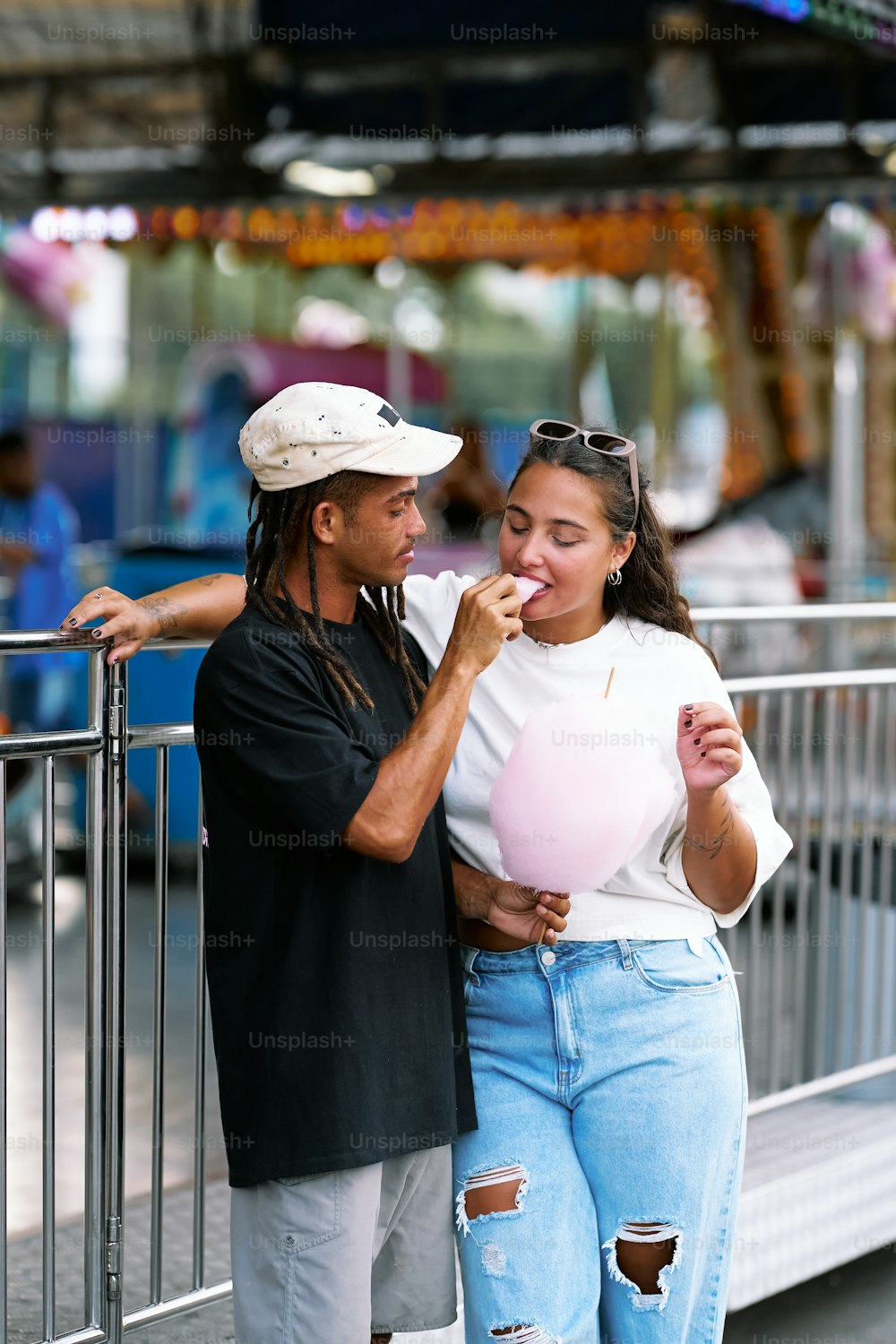 a man and a woman standing next to each other