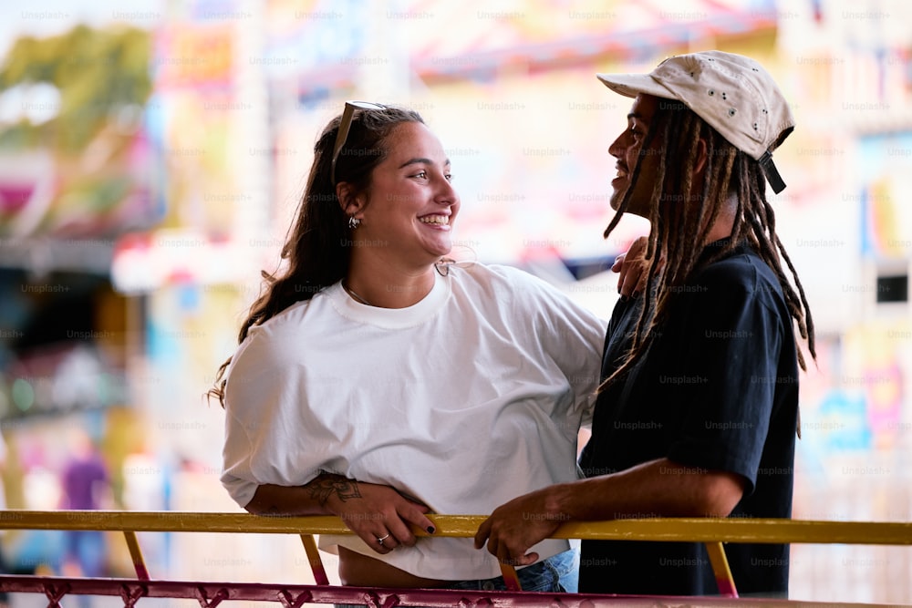 a man and a woman standing next to each other