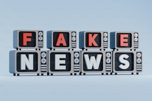 Fake News buchstabiert mit Würfeln vor blauem Hintergrund