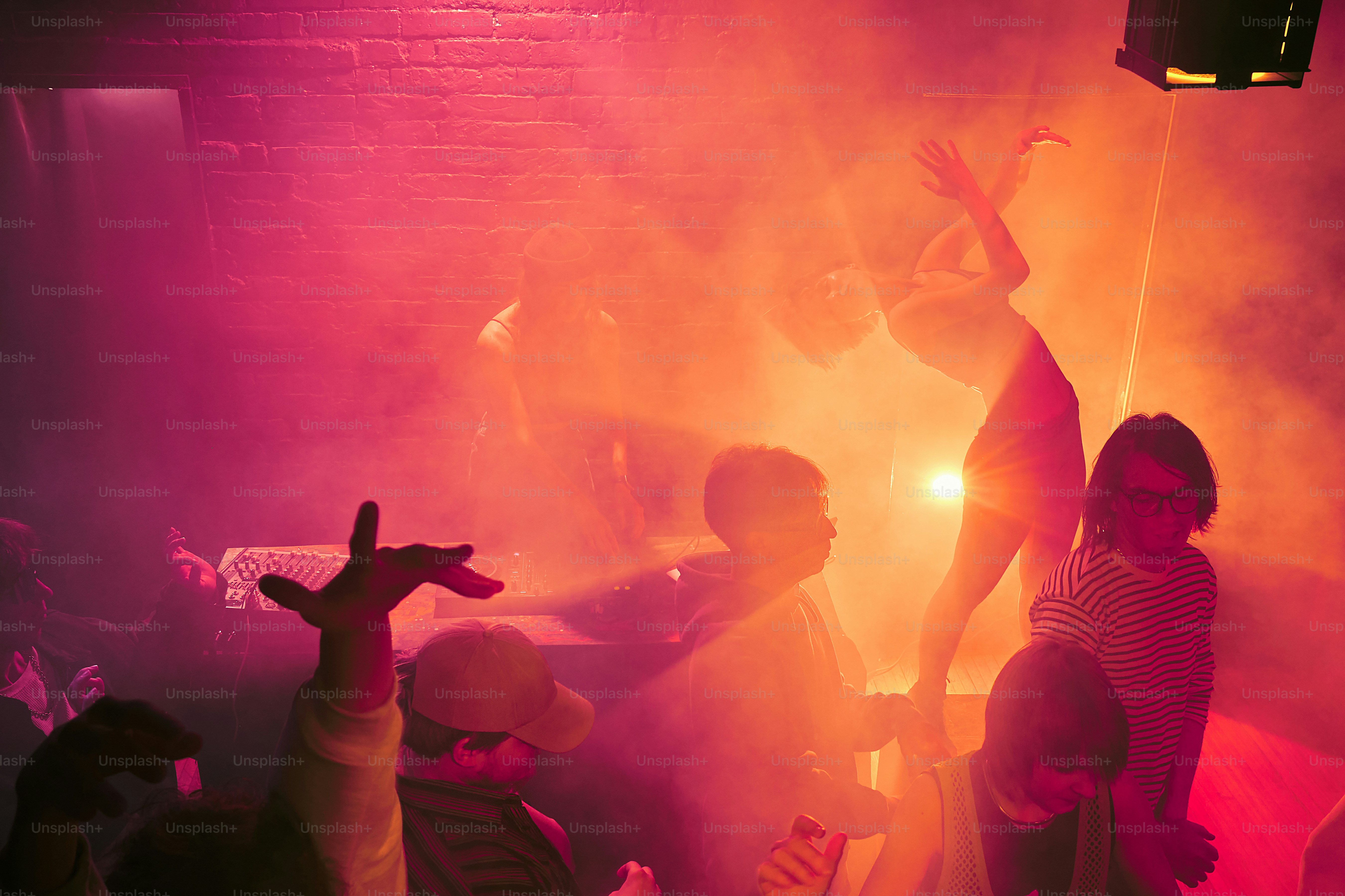 a group of people dancing in a room