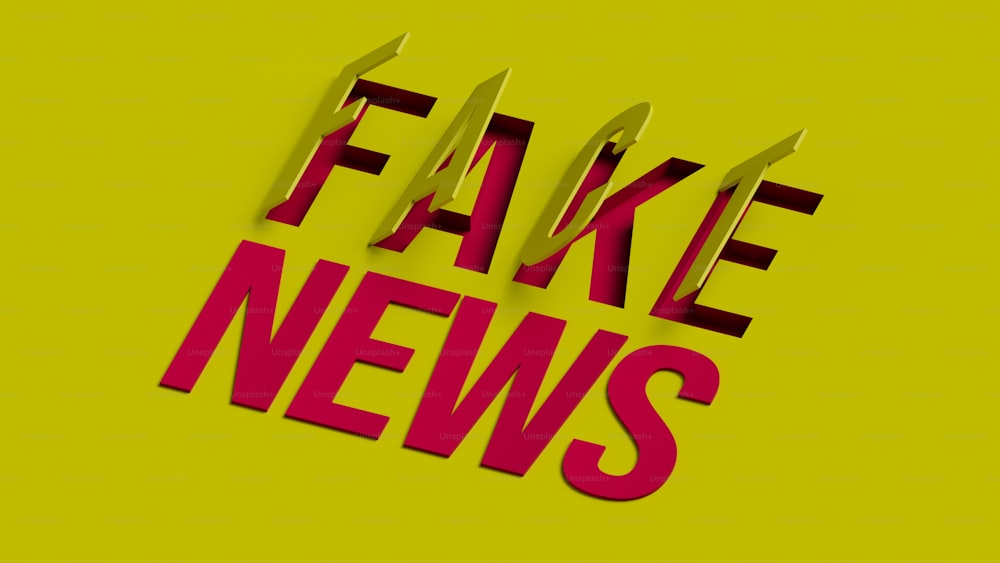 fake news cut out of paper on a yellow background