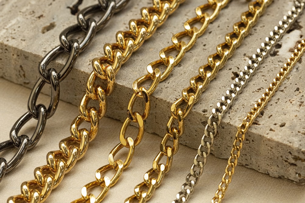 a number of different types of chains on a table