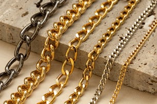 a number of different types of chains on a table