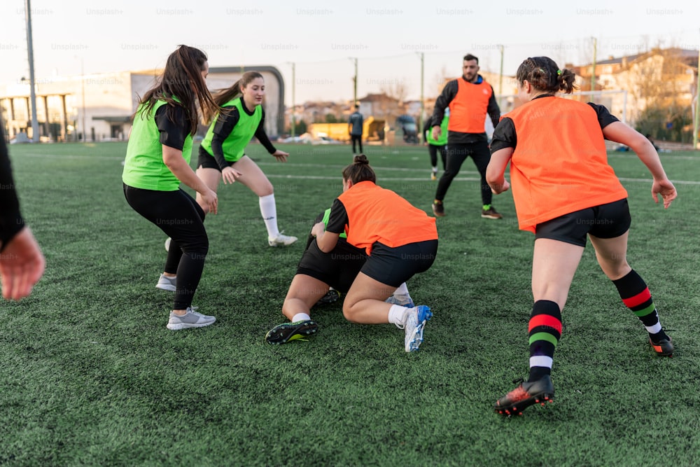 a group of young women playing a game of soccer