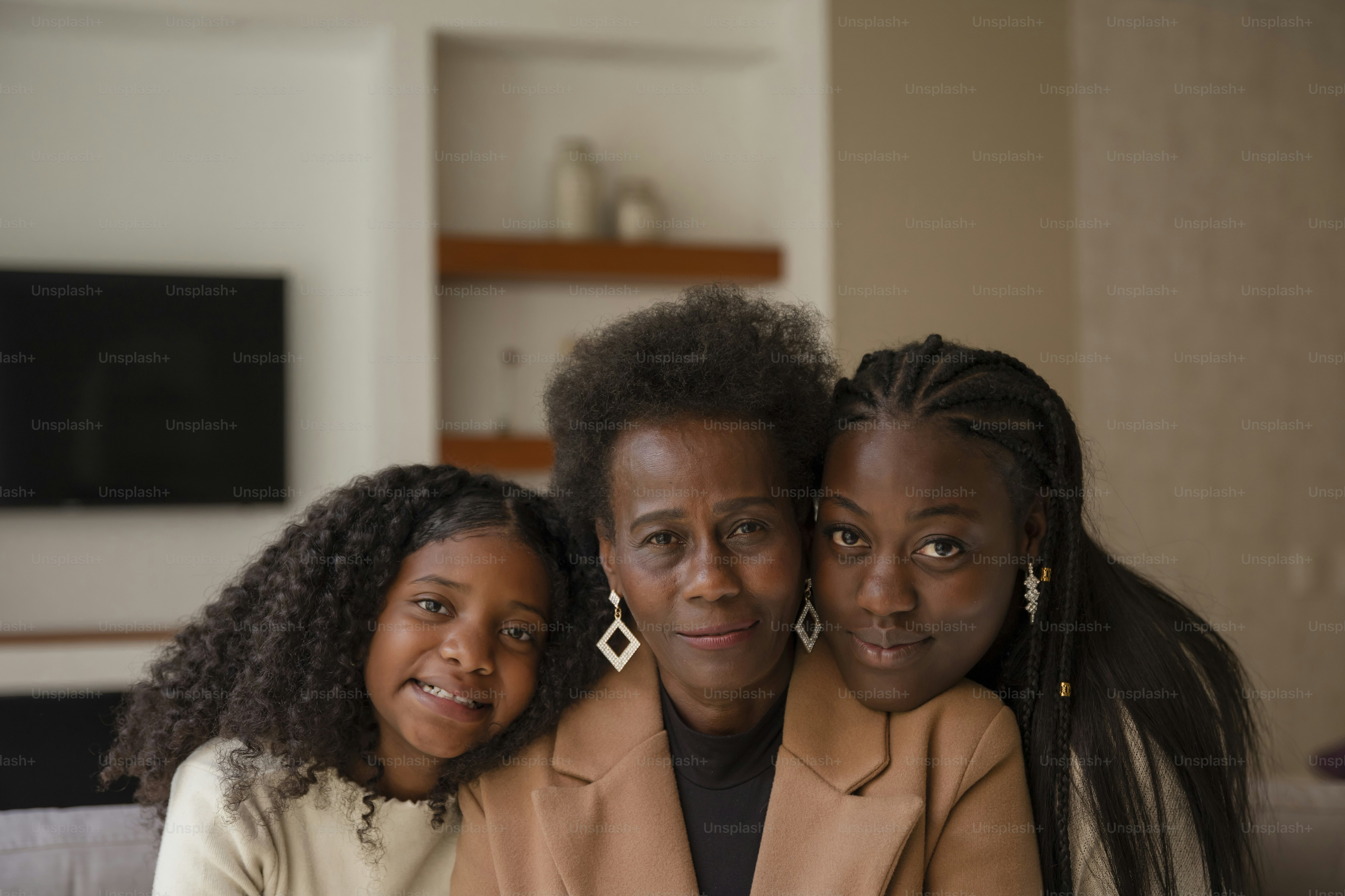 a group of three women sitting next to each other