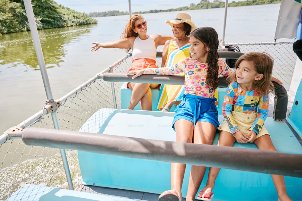 a group of people riding on top of a boat