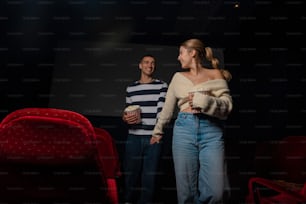 a man and a woman standing next to each other