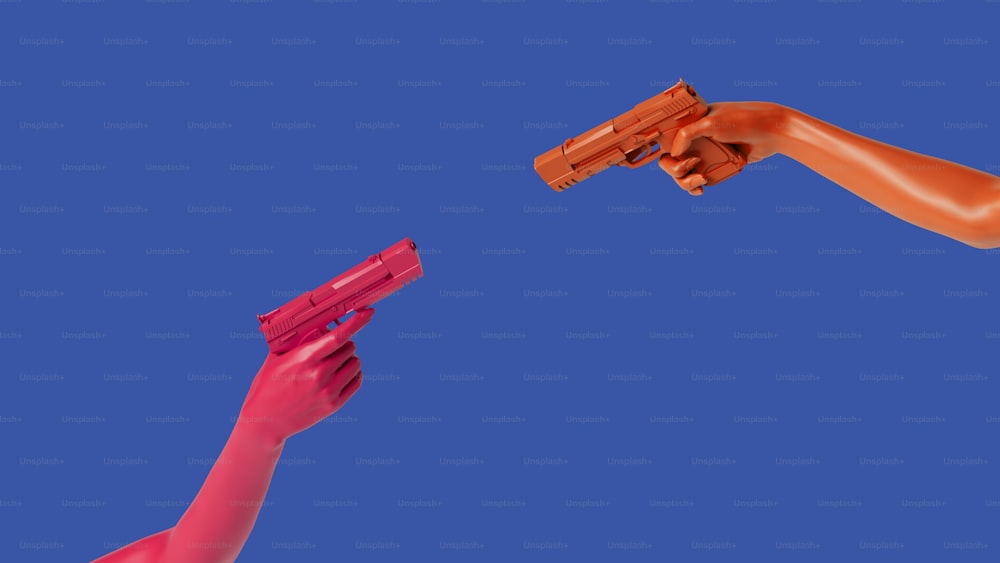 a pair of hands holding a toy gun