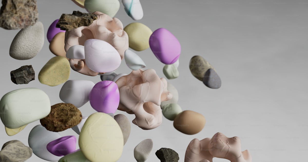 A bunch of rocks flying through the air photo – 3d render Image on Unsplash