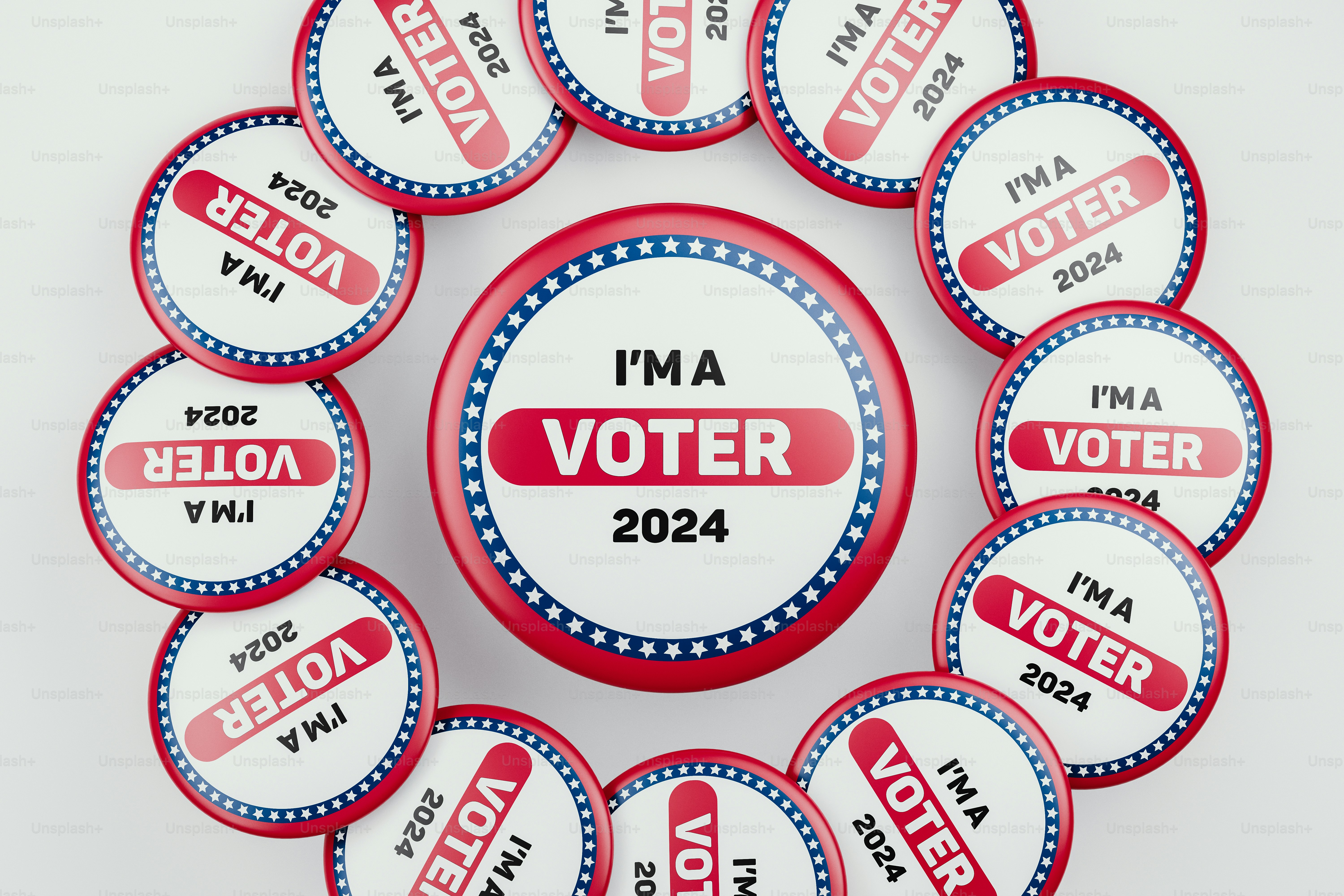a bunch of badges that say i'm a voter
