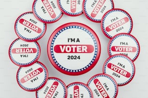 a bunch of badges that say i'm a voter