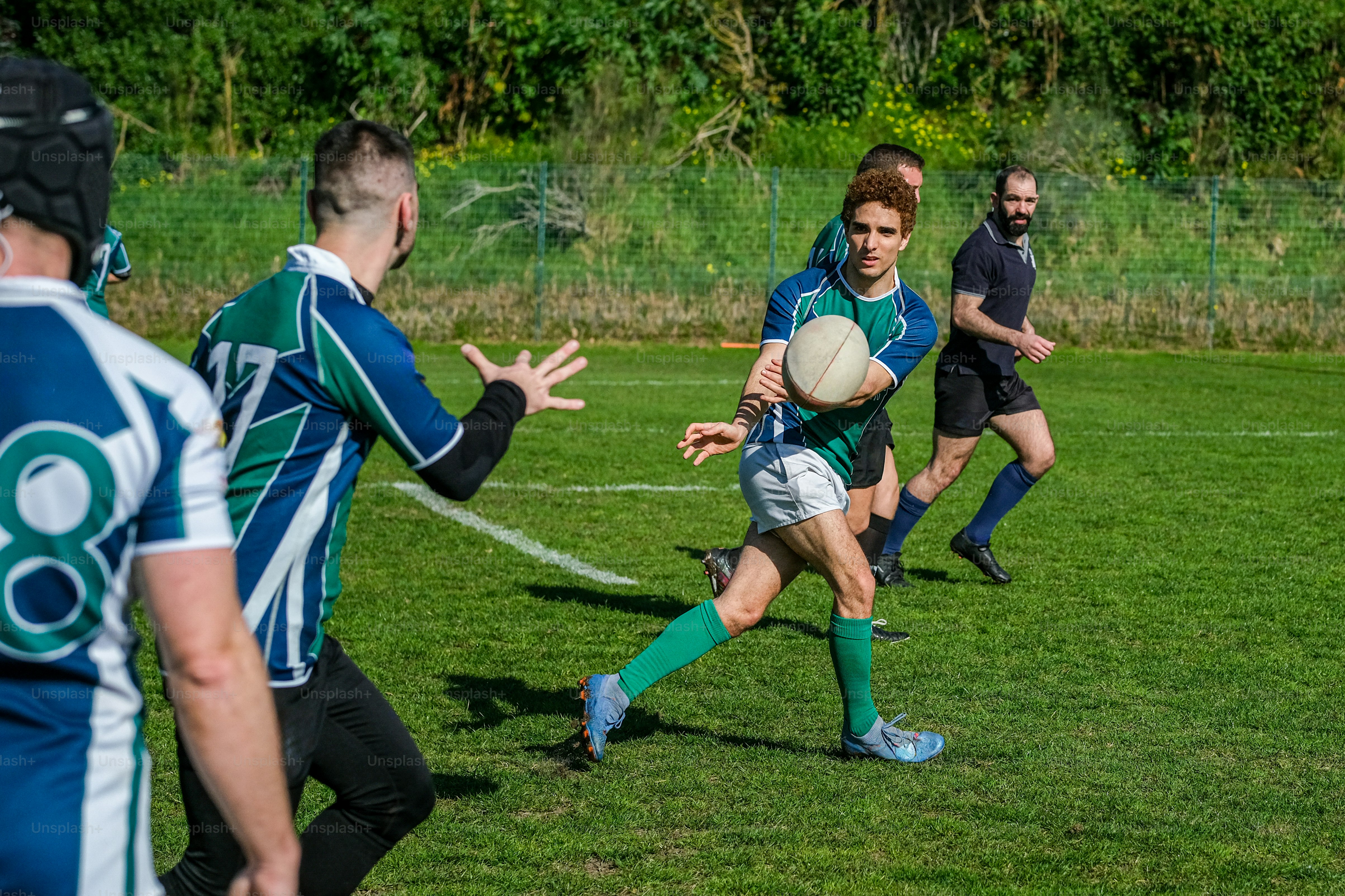 a group of young men playing a game of soccer
