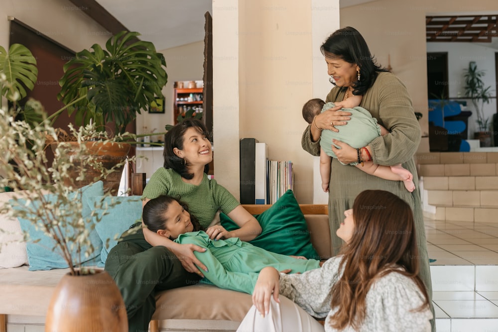 a group of people sitting around a living room together