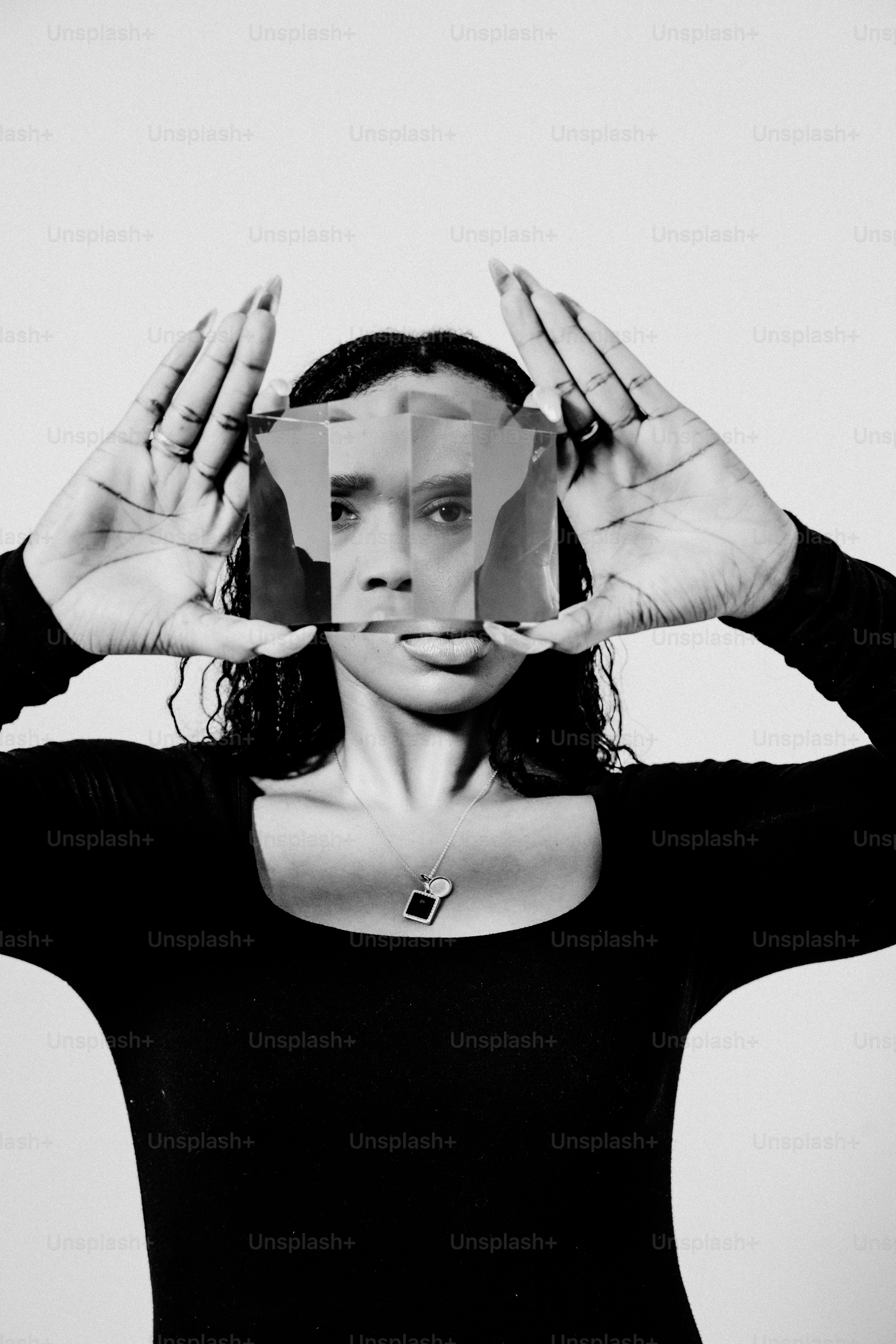 a woman covering her face with her hands