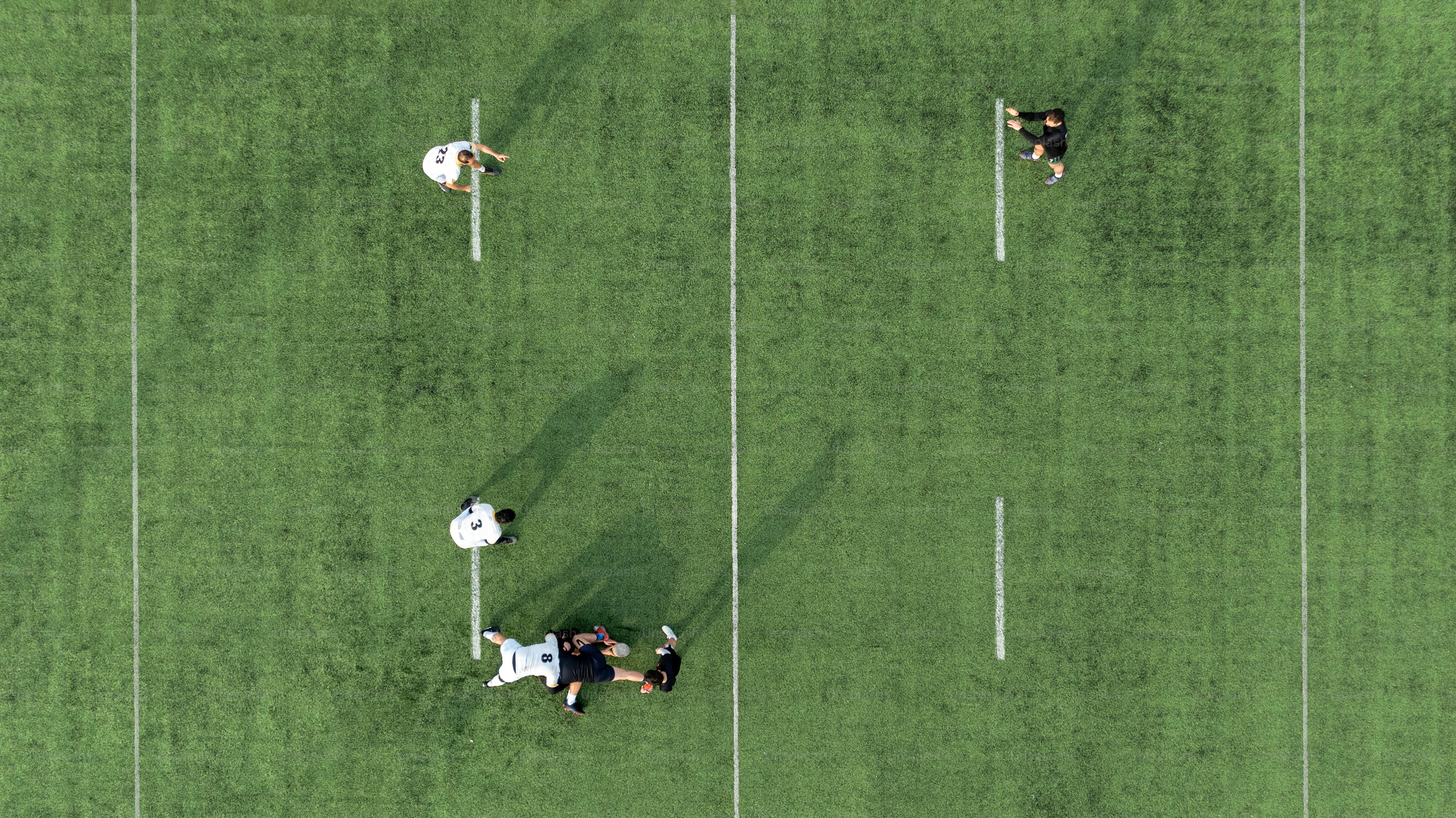 A group of people playing a game of frisbee photo – Rugby Image on Unsplash