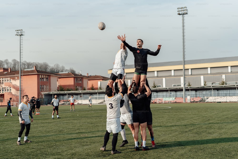 a group of people playing a game of frisbee