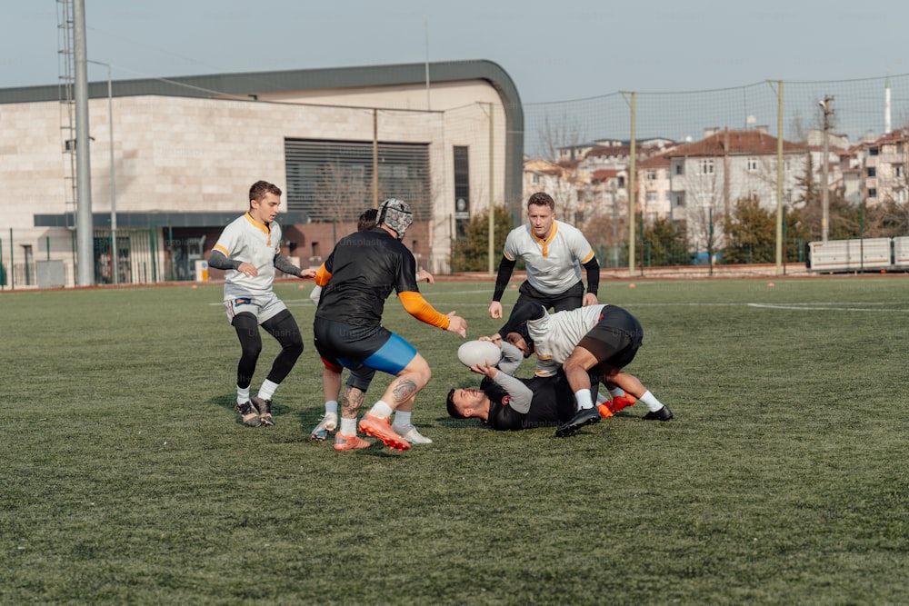 a group of young men playing a game of soccer