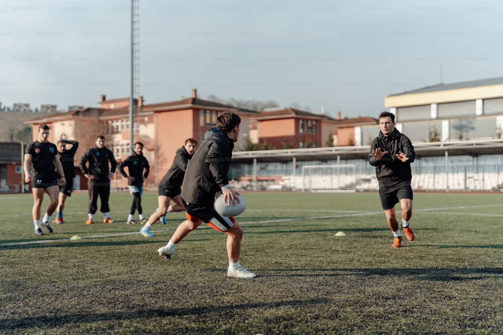 a group of young men playing a game of soccer