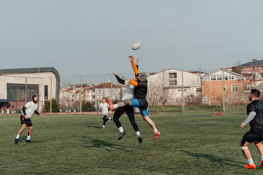 a group of young men playing a game of frisbee