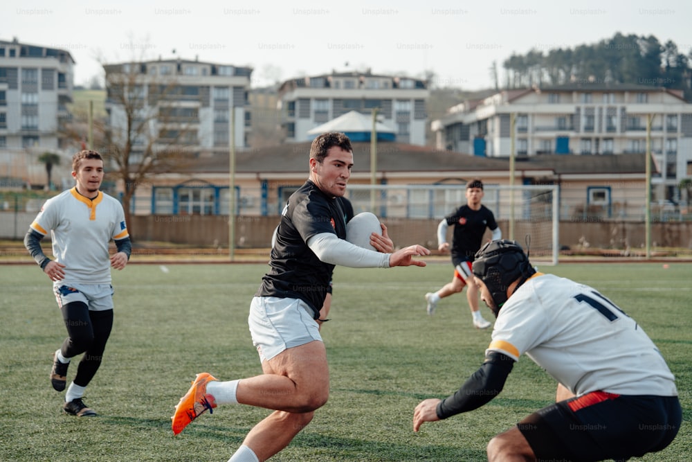 a group of young men playing a game of frisbee