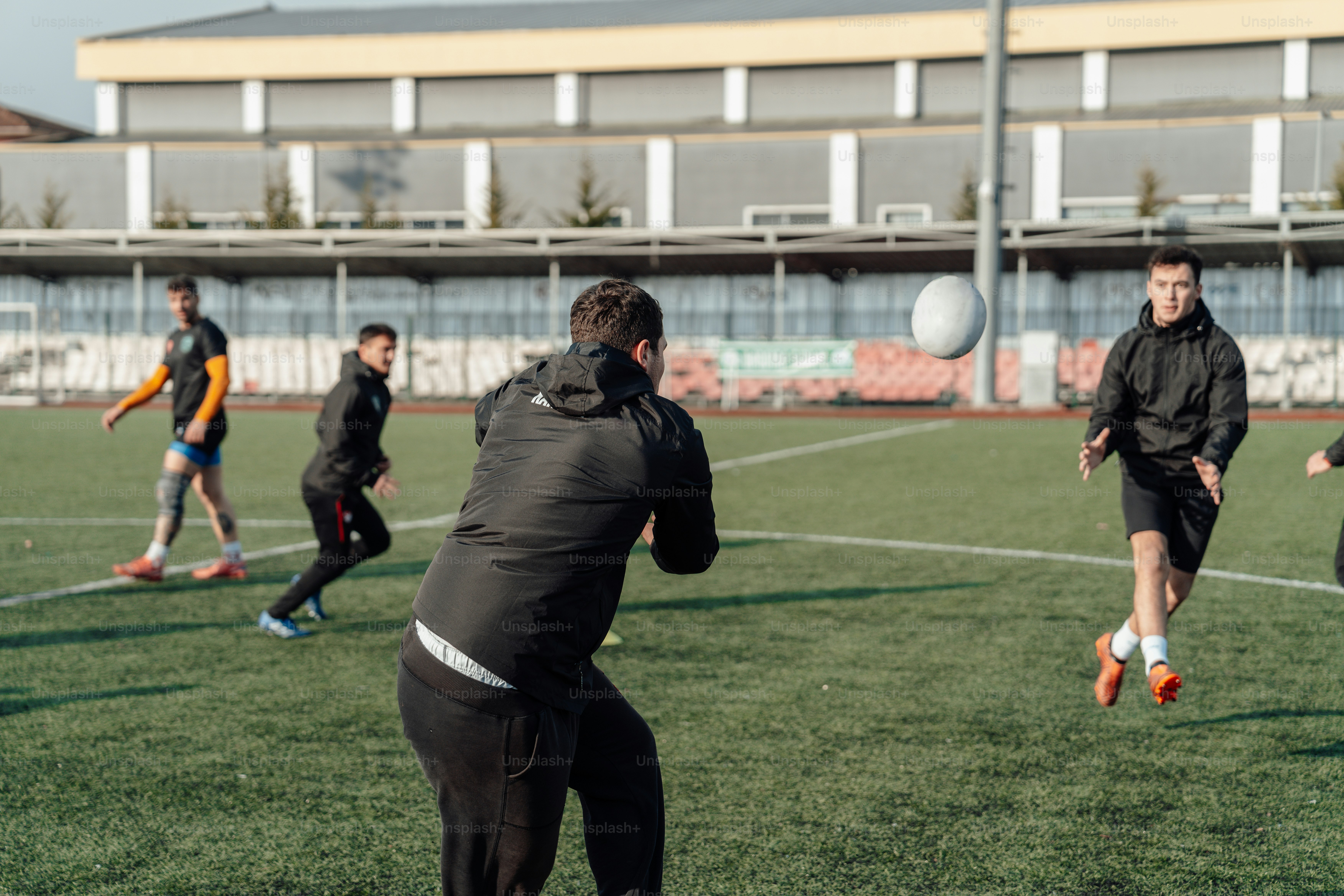 a group of young men playing a game of soccer
