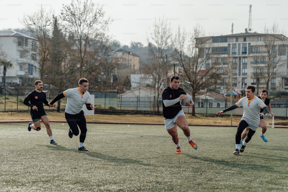 a group of young men playing a game of frisbee