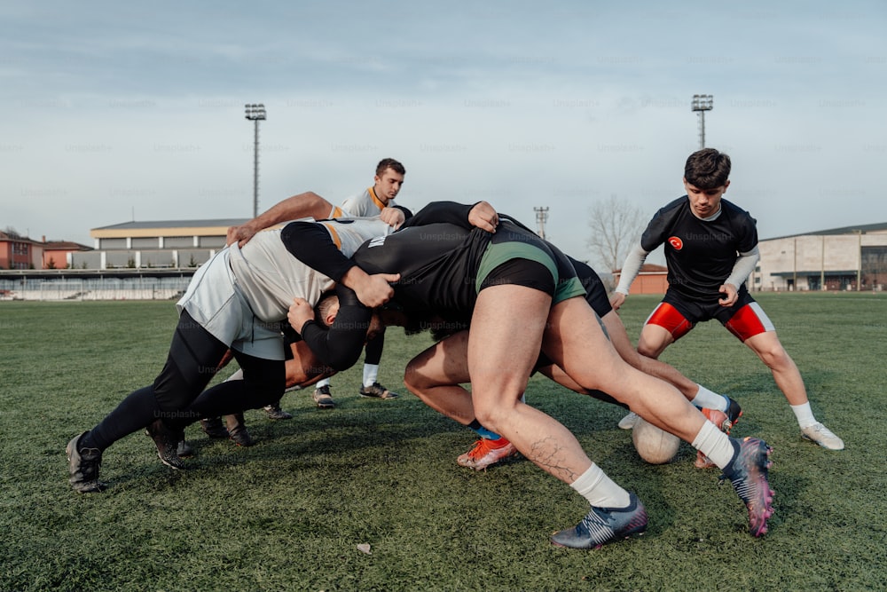 a group of men playing a game of frisbee