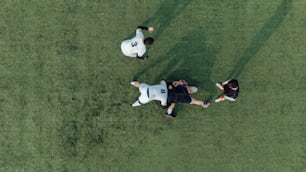 three baseball players standing in the middle of a field