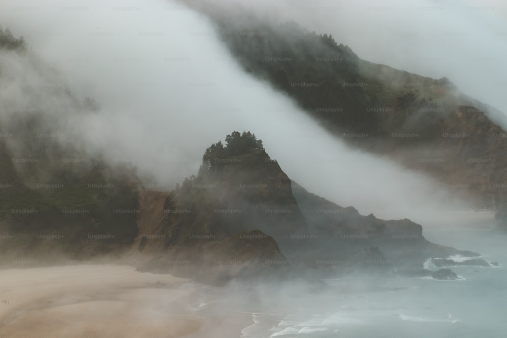 a view of a beach with a mountain in the background