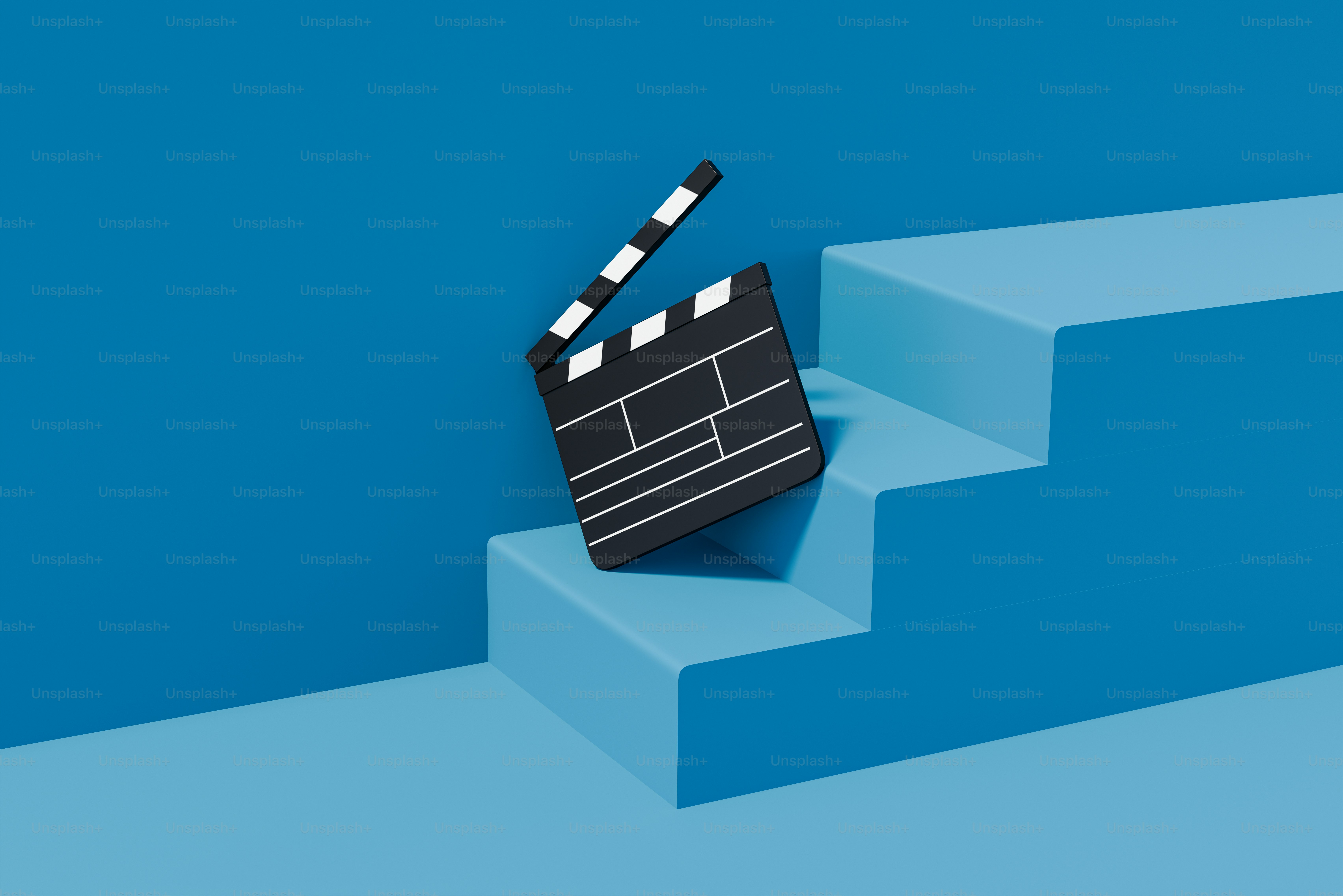 a movie clapper sitting on top of a set of stairs