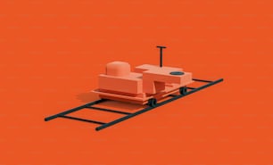 un fondo naranja con un tren de juguete en las vías
