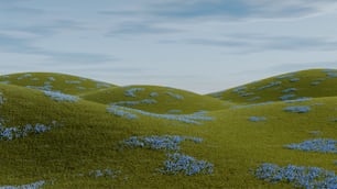 um grupo de colinas verdes com flores azuis sobre eles