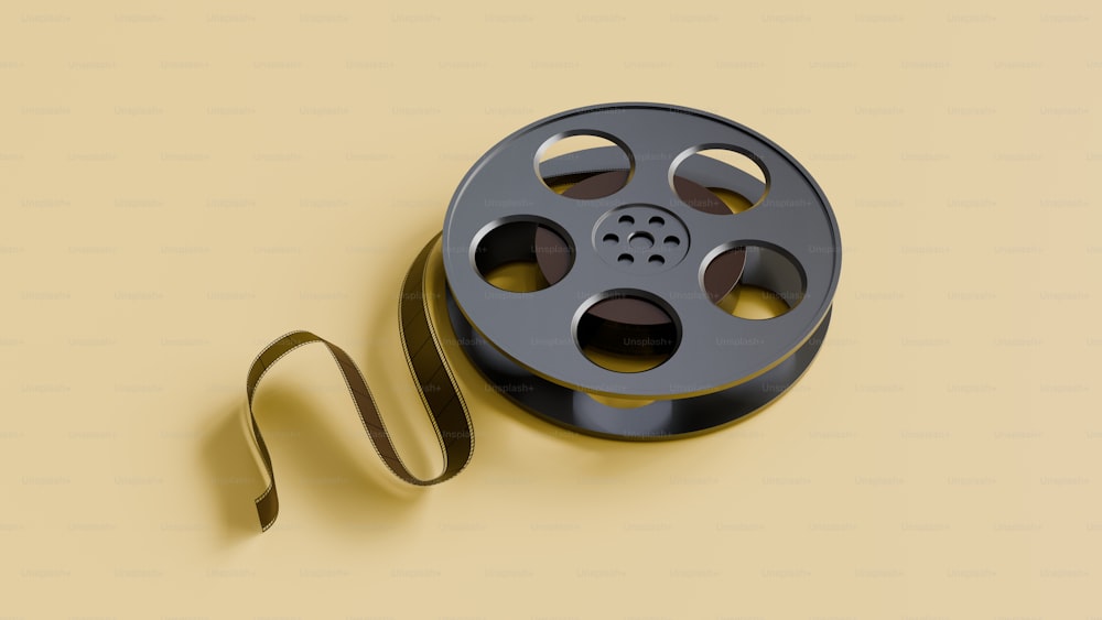 a reel of film on a yellow background