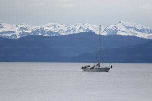 a boat floating on top of a large body of water