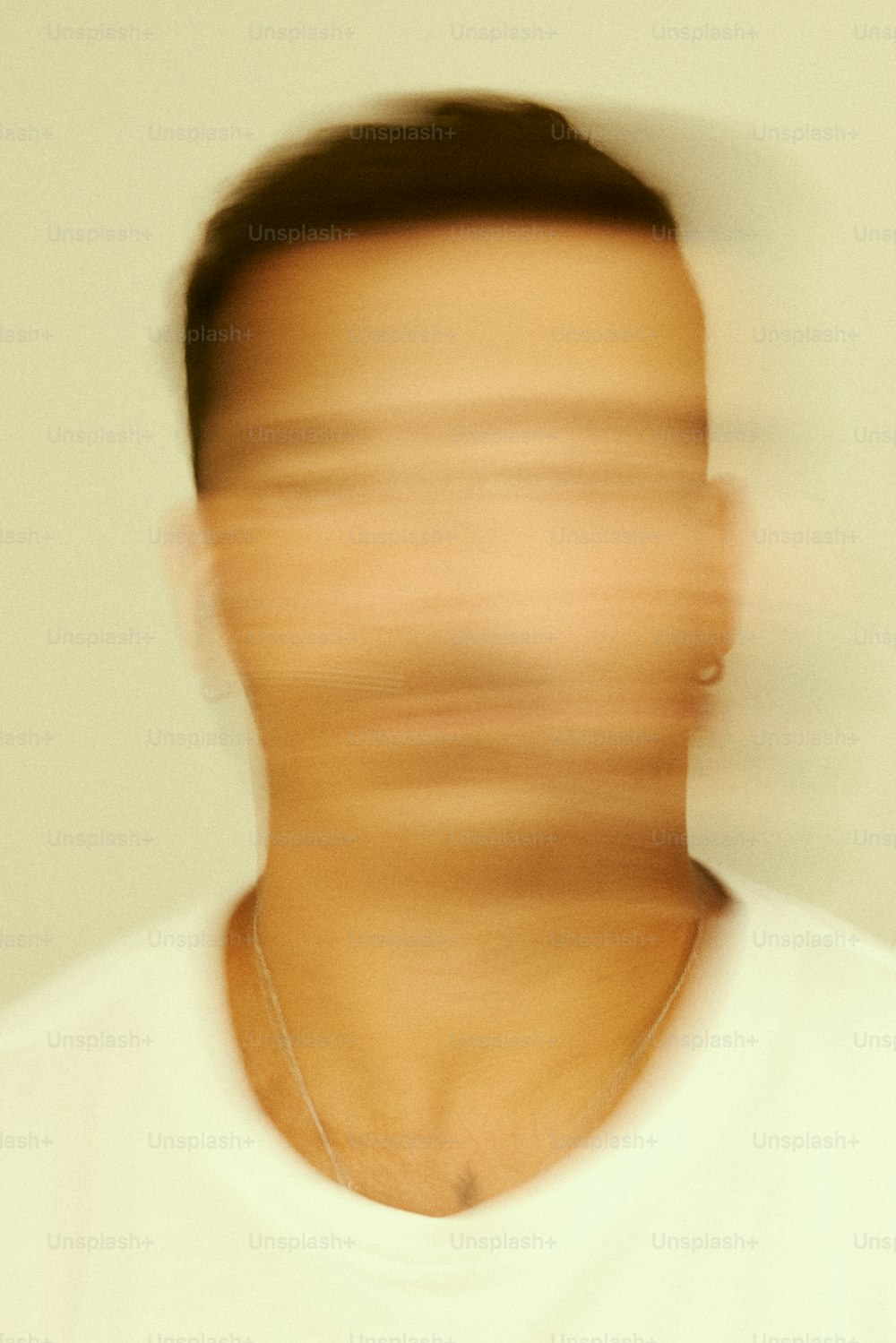 a blurry photo of a man's face