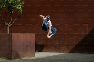 a man flying through the air while riding a skateboard