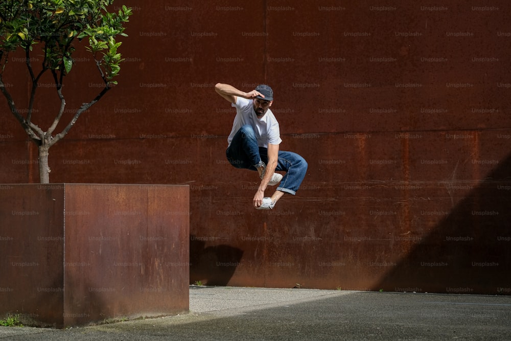 a man flying through the air while riding a skateboard