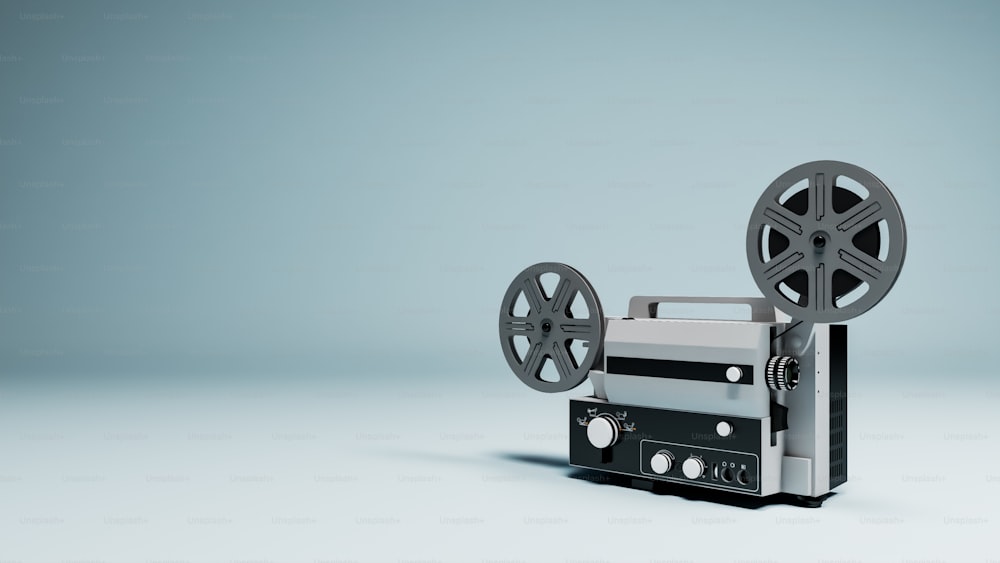 an old fashioned movie projector on a white background