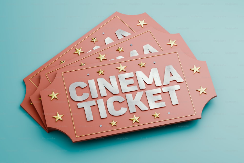 a pink cinema ticket sitting on top of a blue table