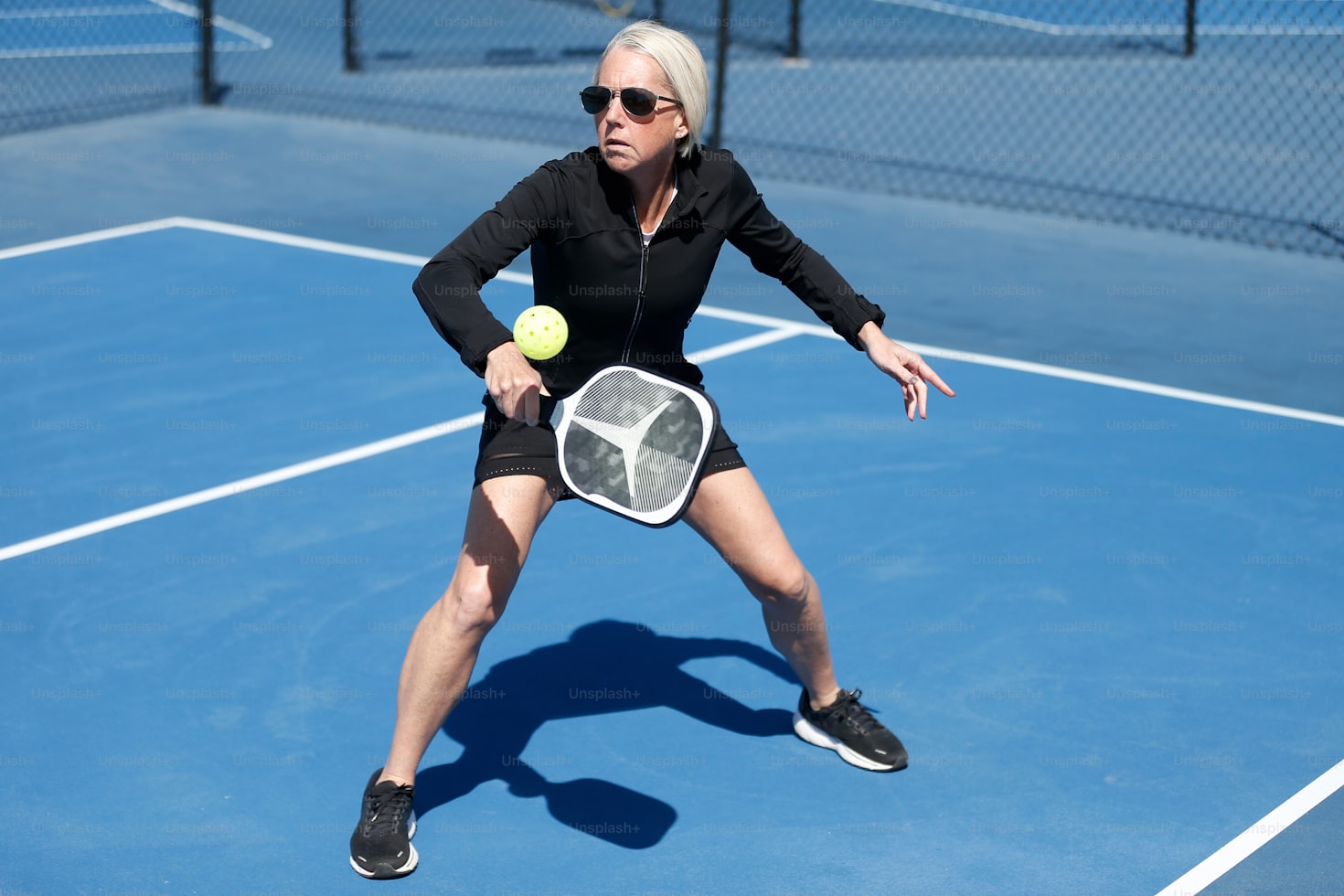 People playing pickleball