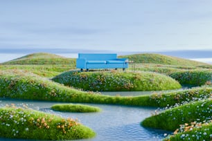 un sofá azul sentado en la parte superior de un exuberante campo verde