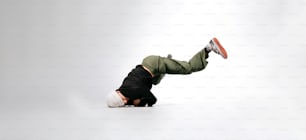 a man doing a handstand on one leg