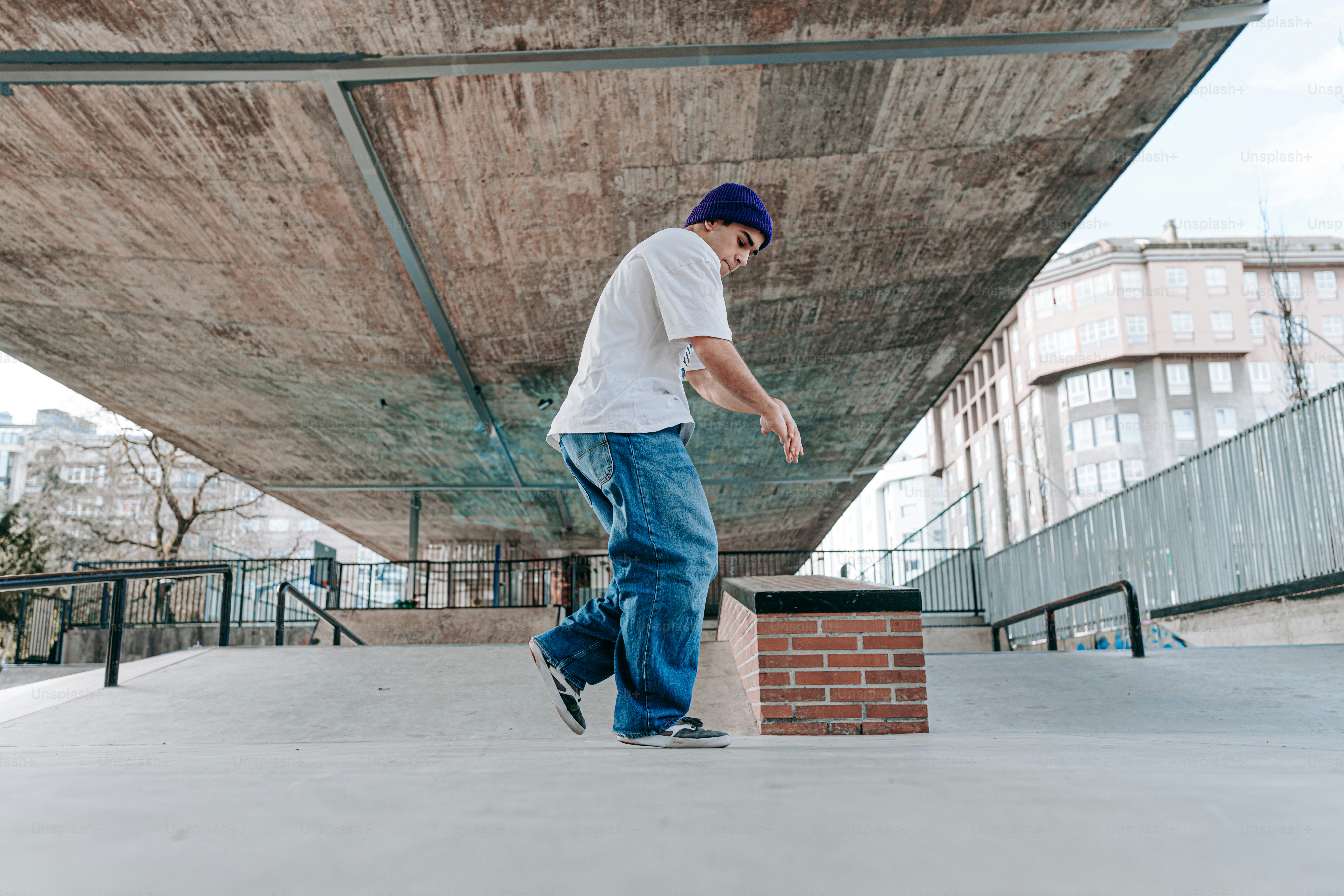 a man riding a skateboard down the side of a ramp