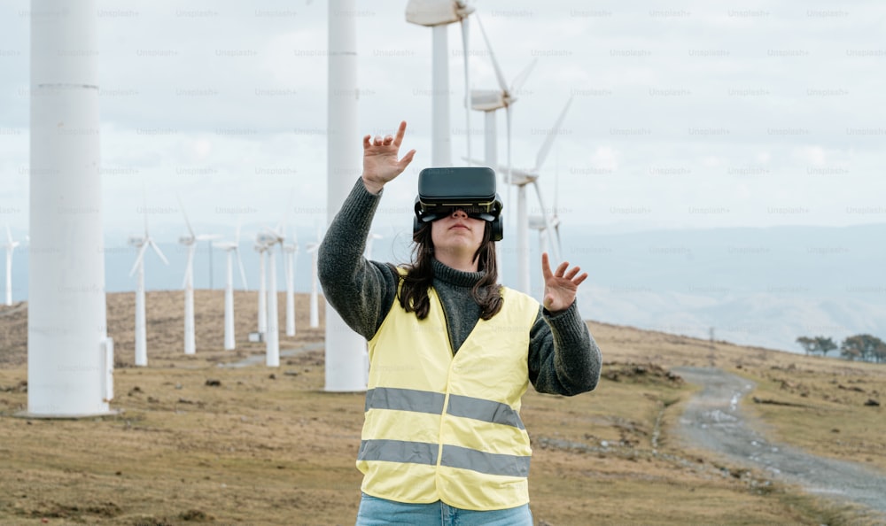 a woman in a yellow vest wearing a virtual reality headset