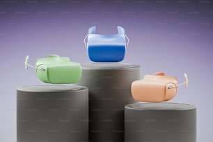 a group of three plastic objects sitting on top of each other