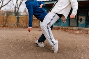 a couple of men playing a game of soccer