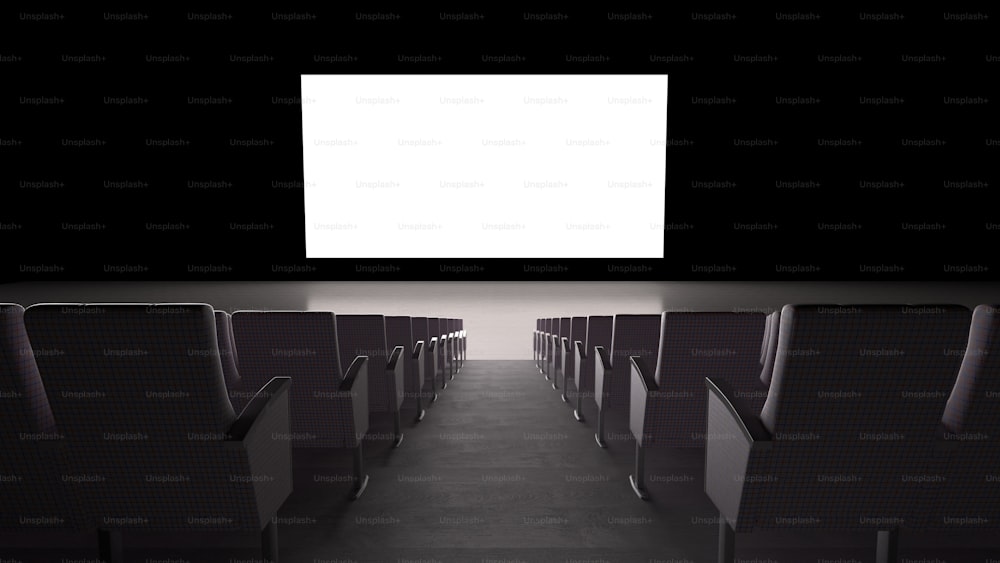 a long row of empty chairs in a dark room