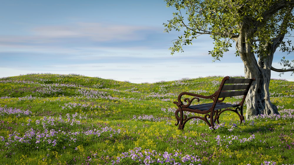 a bench sitting under a tree in a field of flowers