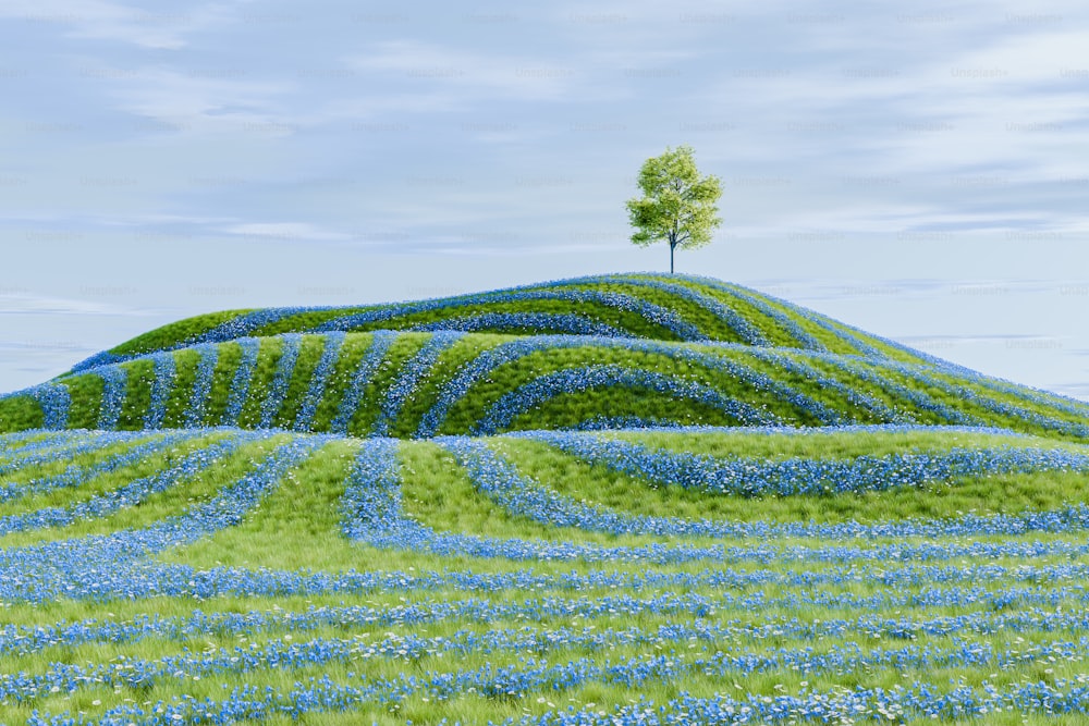 a tree on top of a hill covered in blue flowers