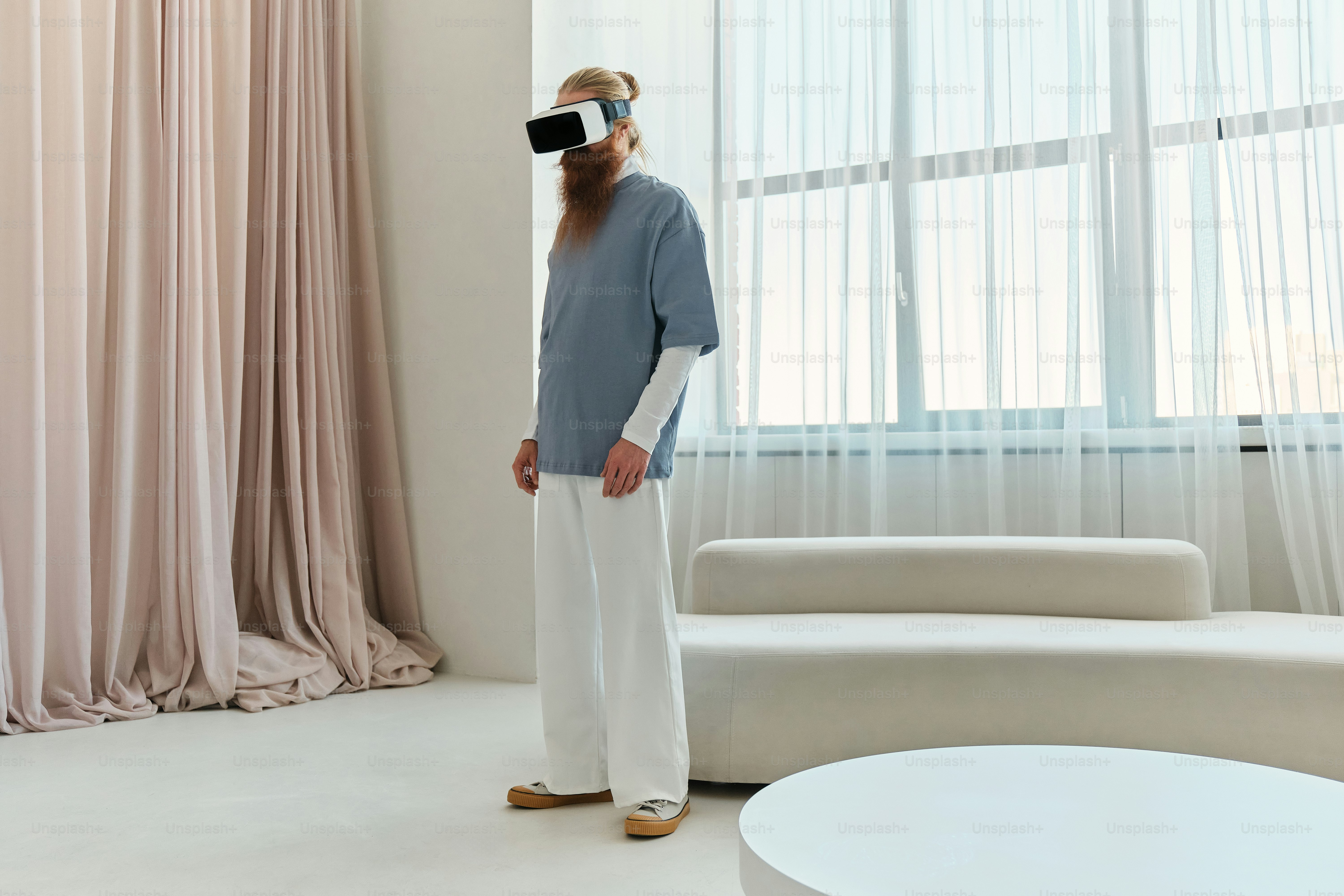 a man watching something in VR headset